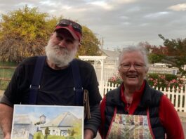 Barbara Tapp with the gentleman who bought her plein air watercolor painting on site