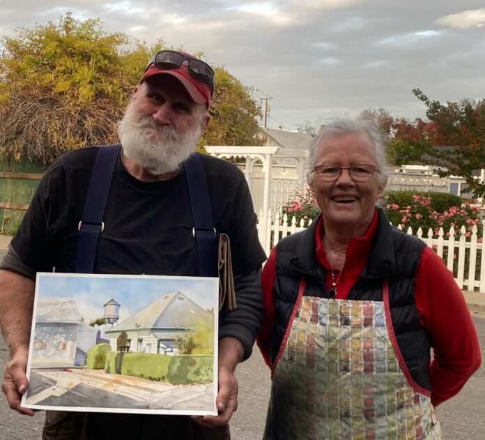 Barbara Tapp with the gentleman who bought her plein air watercolor painting on site